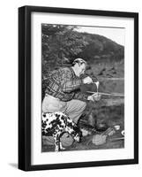 Man and His Dog Camping and Preparing Food-null-Framed Photo