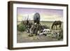 Man and His Dogs Camped by their Covered Wagon on the Great Plains-null-Framed Giclee Print