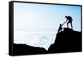 Man and Woman Help Silhouette in Mountains-blas-Framed Stretched Canvas