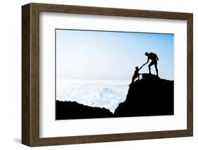 Man and Woman Help Silhouette in Mountains-blas-Framed Photographic Print