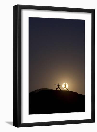 Man and Woman Practice Yoga in Front of a Full Moon in Grand Canyon National Park, Arizona-Louis Arevalo-Framed Photographic Print