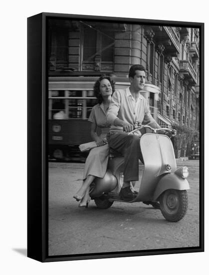 Man and Woman Riding a Vespa Scooter-Dmitri Kessel-Framed Stretched Canvas