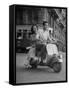 Man and Woman Riding a Vespa Scooter-Dmitri Kessel-Framed Stretched Canvas