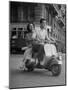 Man and Woman Riding a Vespa Scooter-Dmitri Kessel-Mounted Photographic Print