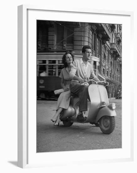 Man and Woman Riding a Vespa Scooter-Dmitri Kessel-Framed Photographic Print