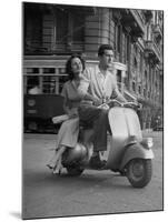 Man and Woman Riding a Vespa Scooter-Dmitri Kessel-Mounted Photographic Print