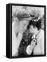 Man and Woman Standing Together with Her Looking Coy at the Camera-null-Framed Stretched Canvas