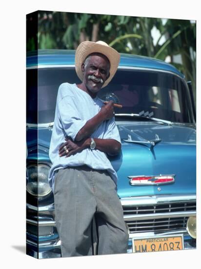 Man at a Front of a Car, Havana, Cuba-Peter Adams-Stretched Canvas