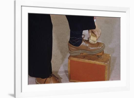 Man Buffing His Shoes-William P. Gottlieb-Framed Photographic Print