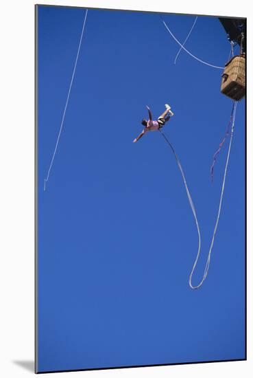 Man Bungee Jumping from a Hot Air Balloon-DLILLC-Mounted Photographic Print