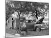 Man Camping Alongside Highway 30-Allan Grant-Mounted Photographic Print