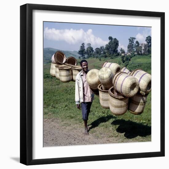 Man Carries Traditional Split-Bamboo Baskets to Sell at Kisoro Market, Southwest Uganda-Nigel Pavitt-Framed Photographic Print