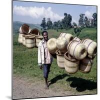 Man Carries Traditional Split-Bamboo Baskets to Sell at Kisoro Market, Southwest Uganda-Nigel Pavitt-Mounted Photographic Print