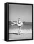 Man Carrying Woman on Beach-Philip Gendreau-Framed Stretched Canvas