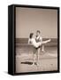 Man Carrying Woman on Beach-Philip Gendreau-Framed Stretched Canvas