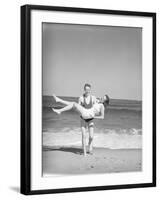 Man Carrying Woman on Beach-Philip Gendreau-Framed Photographic Print