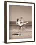 Man Carrying Woman on Beach-Philip Gendreau-Framed Photographic Print