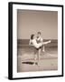 Man Carrying Woman on Beach-Philip Gendreau-Framed Photographic Print