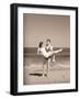 Man Carrying Woman on Beach-Philip Gendreau-Framed Photographic Print