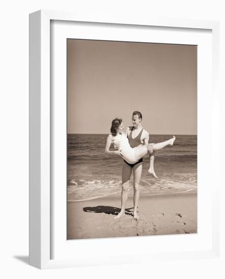 Man Carrying Woman on Beach-Philip Gendreau-Framed Photographic Print