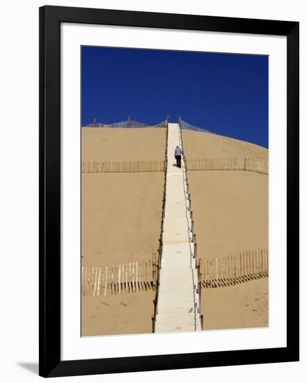 Man Climbing Steps Leading Up to Dunes Du Pyla, Bay of Arcachon, Cote D'Argent, Aquitaine-Peter Richardson-Framed Photographic Print