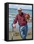 Man Crabbing and Digging for Razor Clams in Sand, Queen Charlotte Islands, Canada-Savanah Stewart-Framed Stretched Canvas