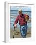 Man Crabbing and Digging for Razor Clams in Sand, Queen Charlotte Islands, Canada-Savanah Stewart-Framed Photographic Print