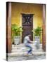 Man Cycling Past Doorway in Old Town of Galle Fort, Galle, Sri Lanka-Ian Trower-Stretched Canvas