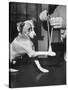 Man Demonstrating Proper Way to Put Splint on Dog in Event of First Aid Being Required-John Phillips-Stretched Canvas