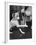 Man Demonstrating Proper Way to Put Splint on Dog in Event of First Aid Being Required-John Phillips-Framed Photographic Print