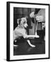 Man Demonstrating Proper Way to Put Splint on Dog in Event of First Aid Being Required-John Phillips-Framed Photographic Print