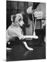 Man Demonstrating Proper Way to Put Splint on Dog in Event of First Aid Being Required-John Phillips-Mounted Photographic Print