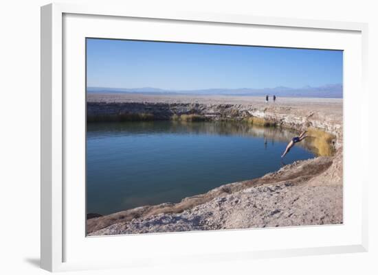 Man Diving into One of the Twin Fresh Lakes (Sala Eyes) in San Pedro De Atacama-Kimberly Walker-Framed Photographic Print