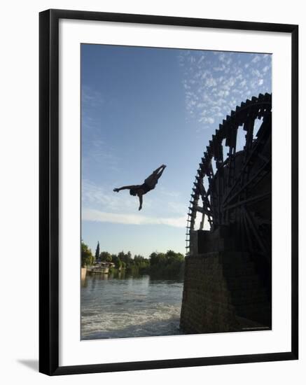 Man Diving off Water Wheel, Orontes River, Hama, Syria, Middle East-Christian Kober-Framed Photographic Print