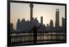 Man Doing Morning Exercises and City Skyline, Shanghai, China-Peter Adams-Framed Photographic Print