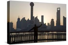 Man Doing Morning Exercises and City Skyline, Shanghai, China-Peter Adams-Stretched Canvas