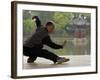 Man Doing Tai Chi Exercises at Black Dragon Pool with One-Cent Pavilion, Lijiang, China-Pete Oxford-Framed Photographic Print