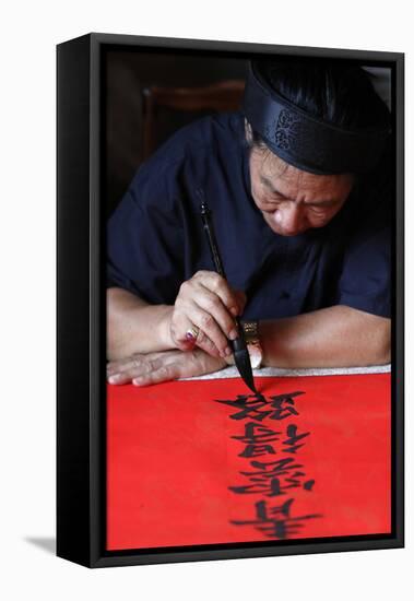 Man doing traditional Chinese writing (calligraphy) in ink using a brush, The Temple of Literature-Godong-Framed Stretched Canvas