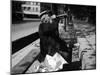 Man Drinking Wine and Eating a Sandwich on a Public Bench During the Ongoing French Economic Crisis-null-Mounted Photographic Print