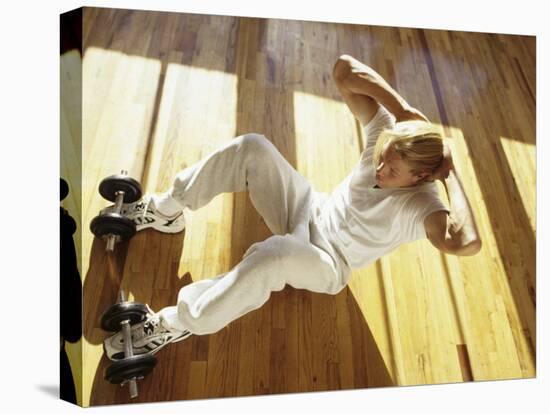 Man Engaged in Sit Up Exercise in Gym, New York, New York, USA-Chris Trotman-Stretched Canvas