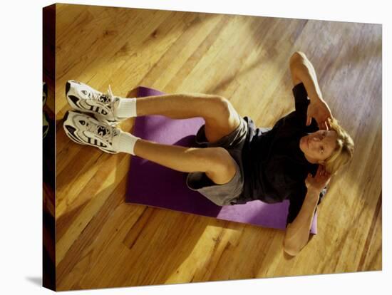 Man Engaged in Sit Up Exercise in Gym, New York, New York, USA-Chris Trotman-Stretched Canvas