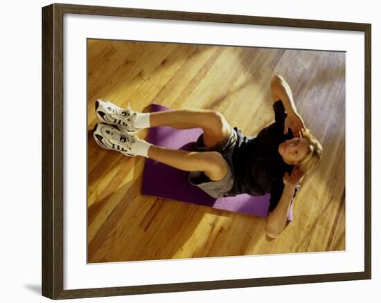 Man Engaged in Sit Up Exercise in Gym, New York, New York, USA-Chris Trotman-Framed Photographic Print