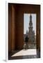 Man enjoying the view of Plaza de Espana, framed through an archway, Seville, Andalusia, Spain-Shanna Baker-Framed Photographic Print