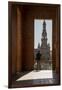 Man enjoying the view of Plaza de Espana, framed through an archway, Seville, Andalusia, Spain-Shanna Baker-Framed Photographic Print