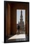 Man enjoying the view of Plaza de Espana, framed through an archway, Seville, Andalusia, Spain-Shanna Baker-Framed Photographic Print