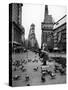 Man Feeding Pigeons in an Empty Times Square During a Taxi Strike-Yale Joel-Stretched Canvas