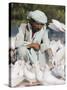 Man Feeding the Famous White Pigeons, Mazar-I-Sharif, Afghanistan-Jane Sweeney-Stretched Canvas