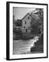 Man Fishing Beside a Waterfall and a 100 Year Old Mill-Bob Landry-Framed Photographic Print