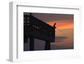 Man fishing from the Tybee Pier at sunrise, Tybee Island, Georgia, USA-Joanne Wells-Framed Photographic Print