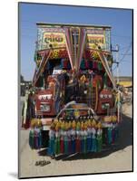 Man Fixing Decoration onto Truck for Diwali Celebrations, Pali District, Rajasthan, India, Asia-Annie Owen-Mounted Photographic Print